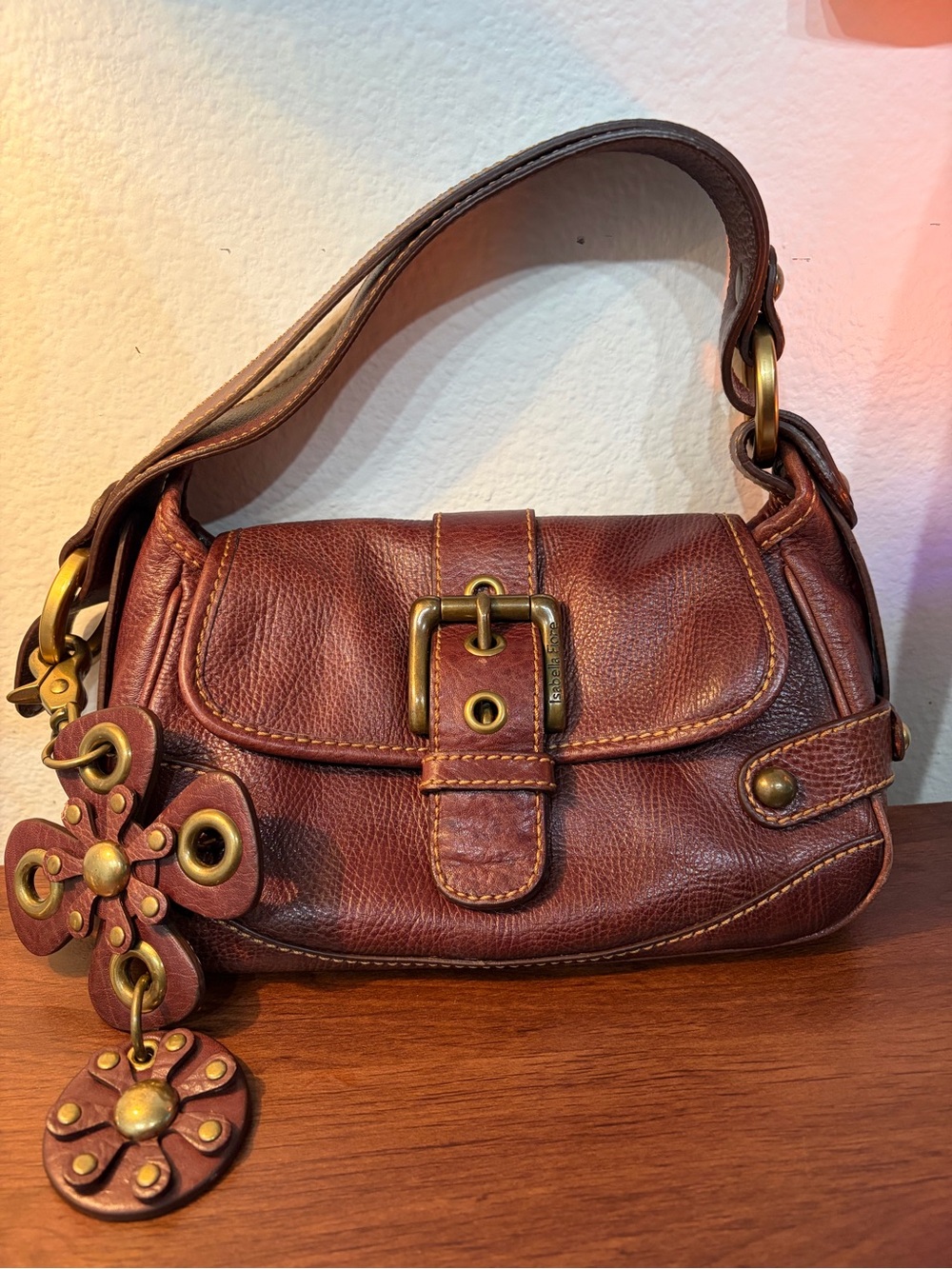 Isabella Fiore Rustic Brown Leather Shoulder Bag with Floral Charm